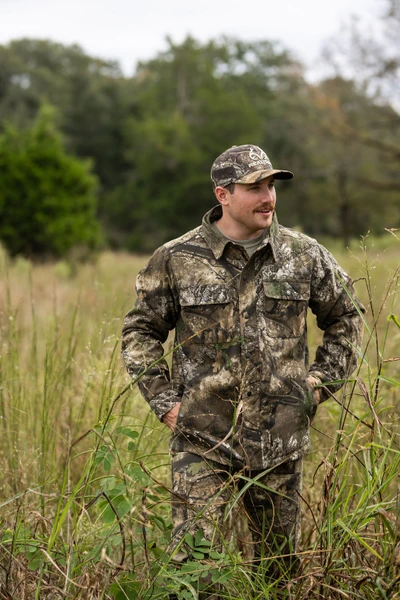 Realtree APX camo work jacket with snap front and chest pockets in tall grass