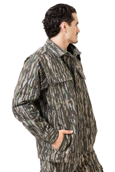 Side profile of camo jacket showing relaxed fit and pocket placement.
