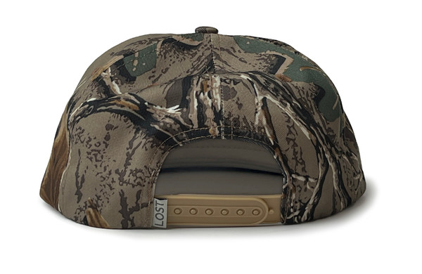Back view of a camo rope hat in Realtree Advantage Classic camouflage with an adjustable tan snapback closure and a small Lost Hat Co. tag.