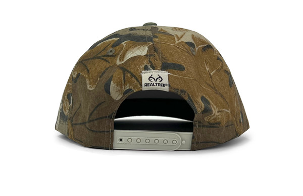 Back view of the camo hat with an adjustable snapback and small Realtree logo tag.
