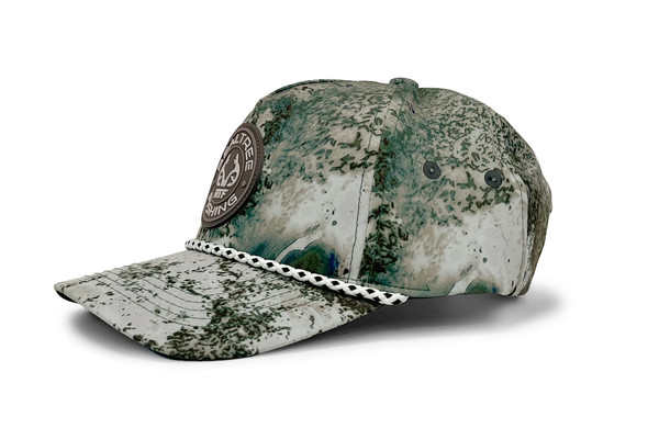 Side view of the Realtree Fishing rope hat showing the green XTREME Colors pattern and decorative front rope.