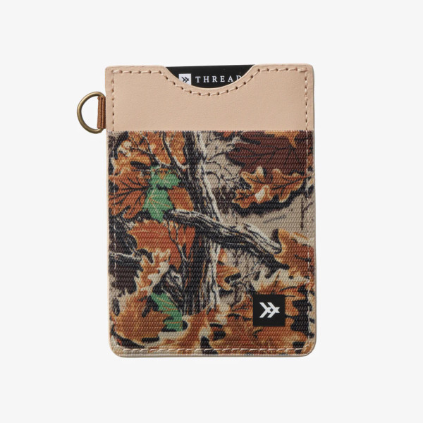 Thread camo vertical wallet in Realtree Advantage Classic with tan leather top and front card slot main