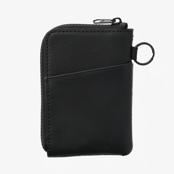 Back view of Thread camo zipper wallet with black leather exterior, card slot, and key ring attachment.