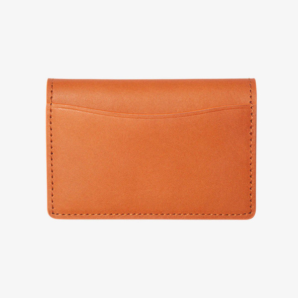 Back view of Thread bifold wallet showing slim orange leather design with rear pocket.