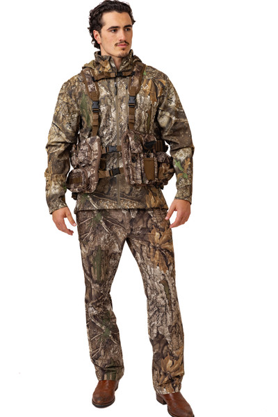 Full-body front view of model wearing Spring Thunder Turkey Vest in Realtree APX camo.