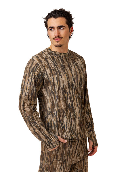Side angle of long sleeve camo crew neck showing lightweight drape.