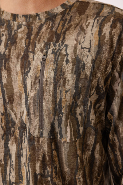 Close-up of zip chest pocket on bamboo long sleeve camo shirt.