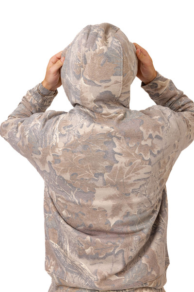 Rear view with hood up showing full camouflage coverage.