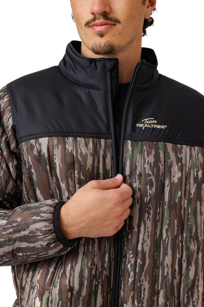 Front detail of stand collar and zipper closure.