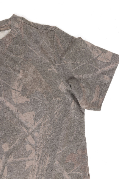 Close-up of soft tri-blend fabric and camo pattern detail.