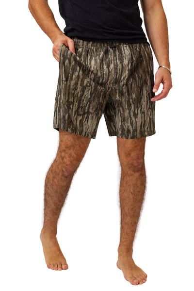 Side view of lined camo shorts showing lightweight fabric and elastic waist.