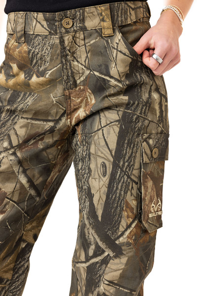 Close-up of front pocket and waistband detail on Realtree Hardwoods camo pants.