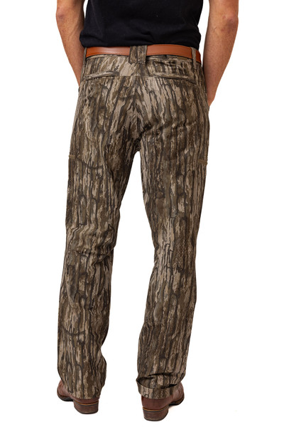Back view of men’s camouflage all-terrain pants with streamlined rear pockets.