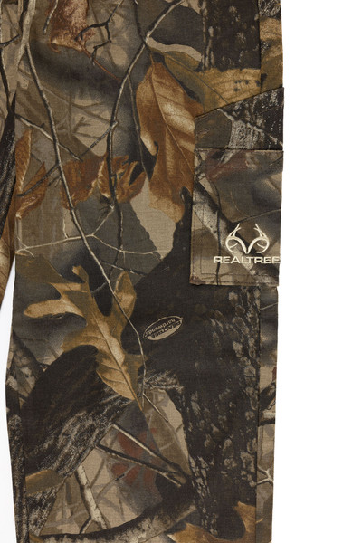 Detailed view of Realtree Hardwoods camouflage fabric and cargo pocket stitching.