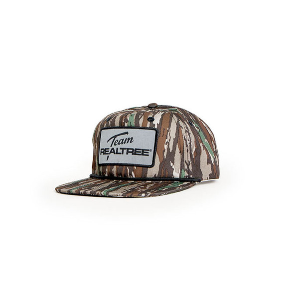 Angled view of Realtree Original camo flat bill hat with Team Realtree logo patch and rope accent main.