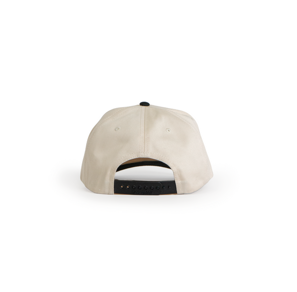 Back view of cream snapback hat with adjustable black closure.