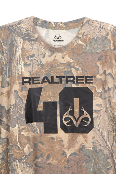 Close-up of “Realtree 40” chest graphic on Advantage Classic camo fabric.