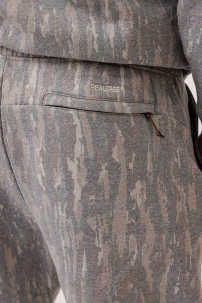 Close-up of rear zip pocket on Realtree Original camo sweatpants.