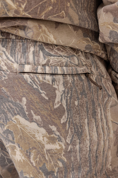 Close-up of Realtree Xtra Grey camo sweatpants showing rear zipper pocket and faded bark camo pattern.