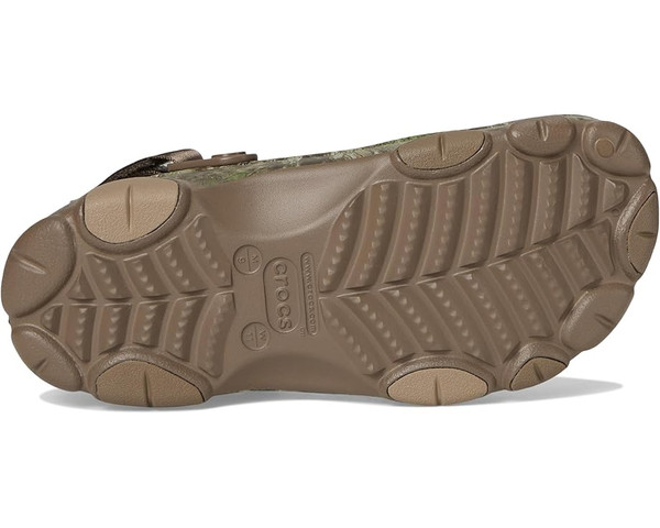 Bottom sole view of Crocs Realtree APX camo clog with durable all terrain tread pattern.