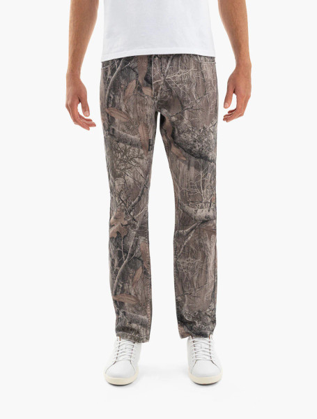 Mugsy men's Realtree EDGE camo denim jeans worn by model, front view main