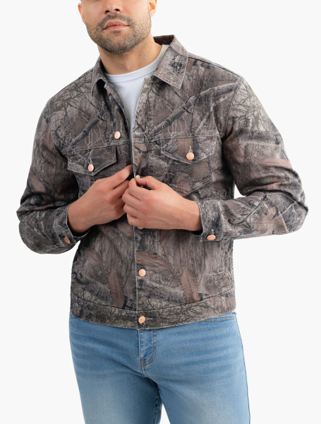 Mugsy men's Realtree EDGE camo denim jacket with button-front closure detail.