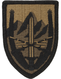 Combined Security Transition Command Scorpion OCP embroidered Army shoulder sleeve insignia with hook fastener backing made in the USA.