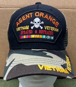 Vietnam Veteran Agent Orange "Sprayed & Betrayed" Black and Camo Mesh Trucker Hat Vietnam Veteran Agent Orange "Sprayed & Betrayed" Black and Camo Mesh Trucker Hat
