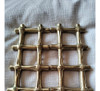 Trivet Expandible En Bronce Dorado. 0