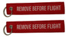 Set De 2 Llaveros Remove Before Flight Tejidos Flexibles 0