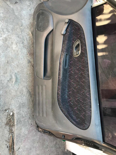 Tapizado De Puerta Acompañante Mitsubishi Colt 1.3/96 1