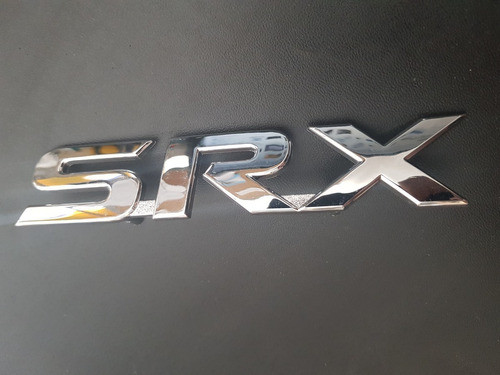 Emblema Insignia Srx  Porton Toyota Hilux 16/ 0