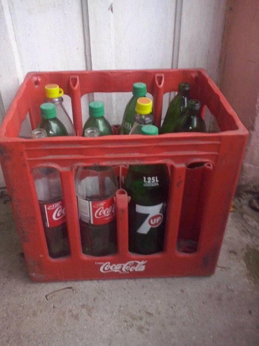 Cajon Coca Cola Con Botellas 1l1/4  4 Coca Cola Y 5 Sevenup 0