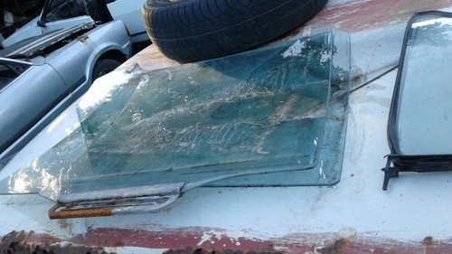 Vidrio Puerta Trasera Izquierda Mazda 323 Cuatro Puertas 0