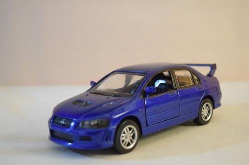 Mitsubishi Lancer Evolution Vii Azul New Ray  1/30 Sin Caja 0
