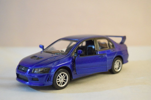 Mitsubishi Lancer Evolution Vii Azul New Ray  1/30 Sin Caja 1