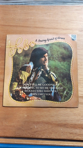 Compacto Vinil Lobo A Cowboy Afraid Of Horses 0