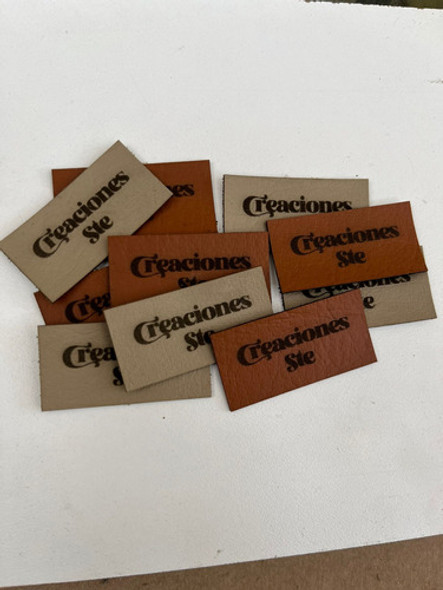 Etiquetas/grifas En Tela Tipo Cuerina// 100 Unidades 1