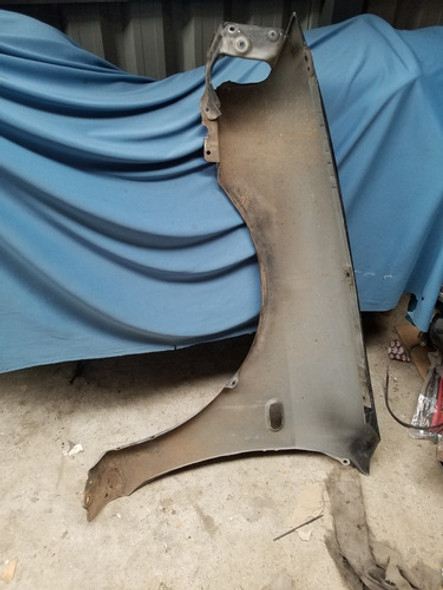 Guardabarro Mitsubishi Lancer 1