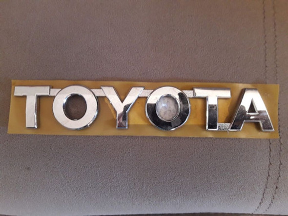 Adesivo Emblema Toyota Novo Original (18x3 Cm) 1 Adesivo Emblema Toyota Novo Original (18x3 Cm) 1