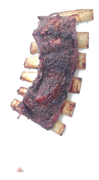 Costillar De Ternera O Novillo Ahumado Al Kamado. 0