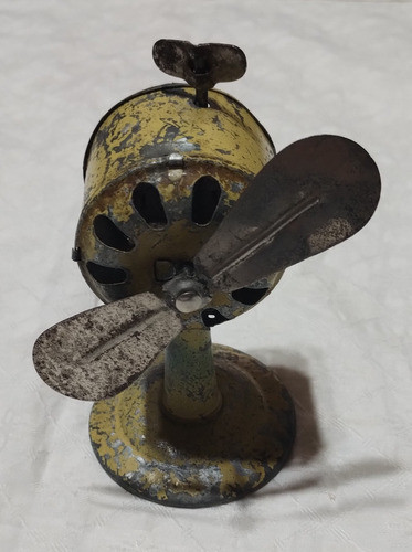 Juguete De Chapa Ventilador A Cuerda Con Movimiento Gira 0