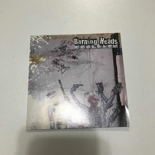 Cd- Burning Heads ( Positive ) 0