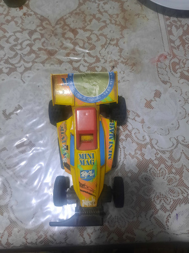 Es Coche De Jueguete A Radio Control.a Pilas 0