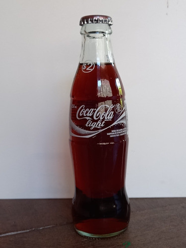 Botella Coca Cola Light Con Valor  $ 2 En Cuello 0