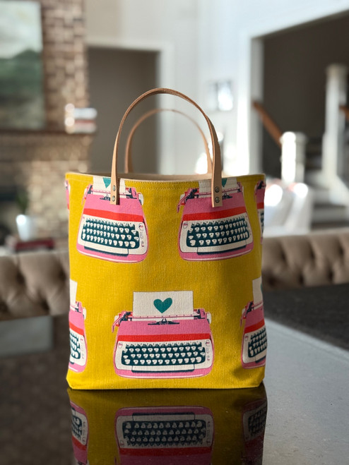 Typewriter Mustard 2025 Bucket Bag