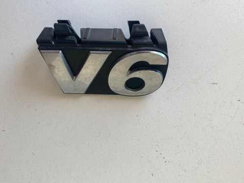 VW AMAROK V6 USED FRONT GRILLE BADGE 
