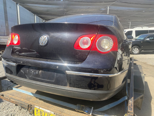 VW PASSAT 3C SEDAN USED REAR BUMPER COVER  IN BLACK C9X PAINT CODE 