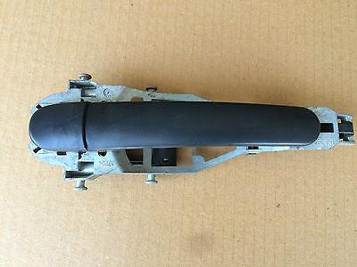 VW GOLF MK5 LHF OUTER DOOR HANDLE WITH THE CARRIER NON PAINTED TYPE