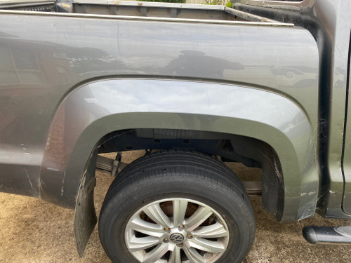 VW AMAROK DUAL CAB USED RHR WHEEL ARCH TRIM IN GREY H7W PAINT CODE